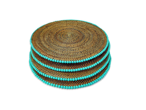 Set of four woven placemats with aqua beads on a white background