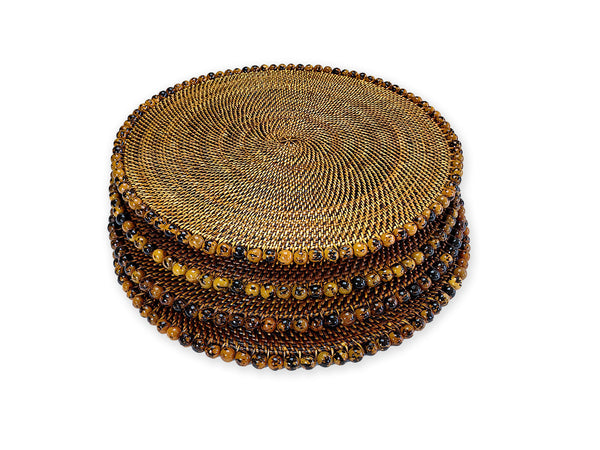 Stack of round woven placemat with a white background
