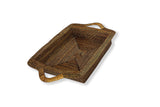 Rectangular handwoven tray with handles on a white background