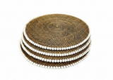 A stack of round woven placemats in a natural brown tone, each bordered with a row of small white beads, photographed on a plain white background.